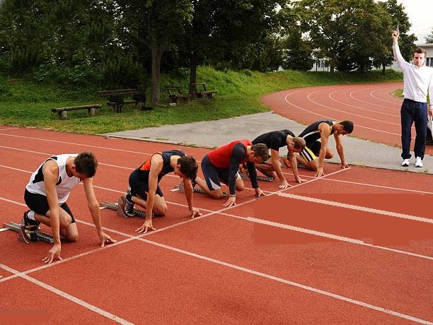 The picture given below shows the athletes lined up at the starting line. The countdown begins and all are focused and alert waiting for the gunshot. ICSE 2025 Biology Solved Question Paper.