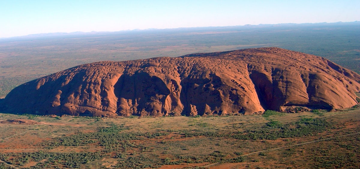 This is a picture of Ayers Rock. Look at the given picture and answer the following questions. Australia, Frank Middle School Geography Solutions ICSE Class 7.